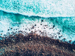 Preview wallpaper sea, waves, foam, shore, stones, pebbles, aerial view