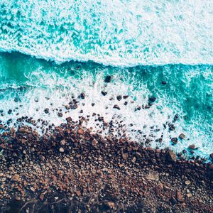 Preview wallpaper sea, waves, foam, shore, stones, pebbles, aerial view