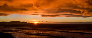 Preview wallpaper sea, waves, hills, sunset, clouds