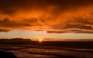Preview wallpaper sea, waves, hills, sunset, clouds