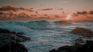 Preview wallpaper sea, waves, rocks, coast, sunset