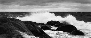 Preview wallpaper sea, waves, splashes, stones, black and white