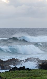 Preview wallpaper sea, waves, splashes, stones, grass, sky, nature