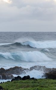 Preview wallpaper sea, waves, splashes, stones, grass, sky, nature