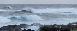 Preview wallpaper sea, waves, splashes, stones, grass, sky, nature