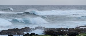 Preview wallpaper sea, waves, splashes, stones, grass, sky, nature