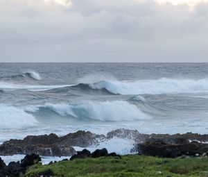 Preview wallpaper sea, waves, splashes, stones, grass, sky, nature