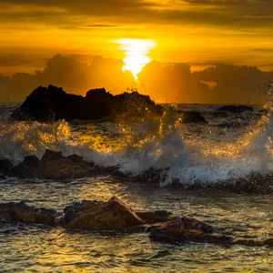 Preview wallpaper sea, waves, splashes, stones, sunset