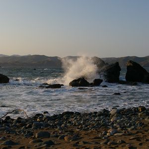 Preview wallpaper sea, waves, splashes, stones, shore, nature