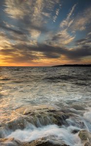 Preview wallpaper sea, waves, stone, clouds, twilight