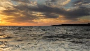 Preview wallpaper sea, waves, stone, clouds, twilight