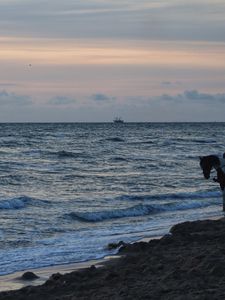 Preview wallpaper sea, waves, surf, ship, horizon, sunset, north holland