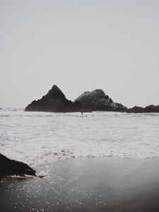 Preview wallpaper sea, waves, surfer, rocks, beach