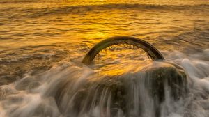Preview wallpaper sea, waves, wheel, sunset