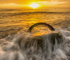 Preview wallpaper sea, waves, wheel, sunset