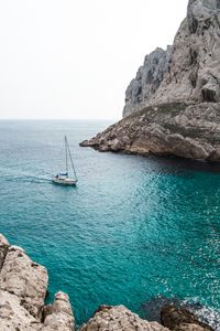 Preview wallpaper sea, yacht, rocks, water, stones