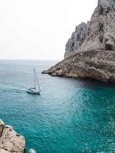 Preview wallpaper sea, yacht, rocks, water, stones