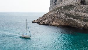 Preview wallpaper sea, yacht, rocks, water, stones