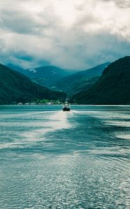 Preview wallpaper ship, boat, mountains, fog, clouds