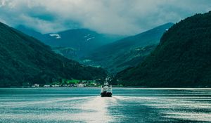 Preview wallpaper ship, boat, mountains, fog, clouds