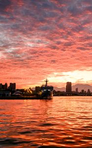 Preview wallpaper ship, buildings, sea, sunset, evening