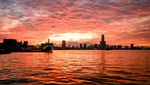 Preview wallpaper ship, buildings, sea, sunset, evening