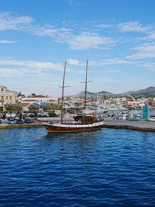 Preview wallpaper ship, masts, sea, houses, embankment