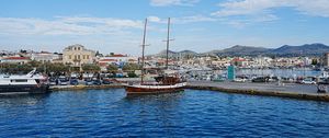 Preview wallpaper ship, masts, sea, houses, embankment