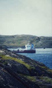 Preview wallpaper ship, sea, coast, hills, rocks