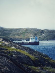 Preview wallpaper ship, sea, coast, hills, rocks