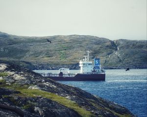 Preview wallpaper ship, sea, coast, hills, rocks