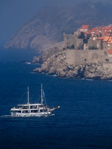 Preview wallpaper ship, sea, rock