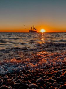 Preview wallpaper ship, sunset, spray, shore