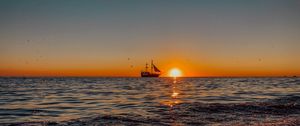 Preview wallpaper ship, sunset, spray, shore