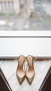 Preview wallpaper shoes, golden, window