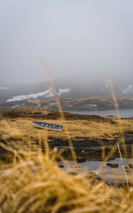 Preview wallpaper shore, boat, fog, lake, hills