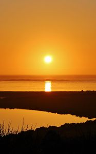 Preview wallpaper shore, grass, water, sunset, nature, dark