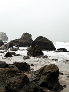 Preview wallpaper shore, rocks, waves, water, sand, sky, nature