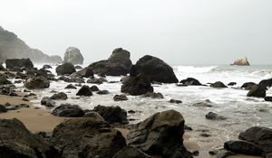 Preview wallpaper shore, rocks, waves, water, sand, sky, nature