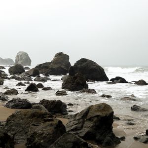 Preview wallpaper shore, rocks, waves, water, sand, sky, nature