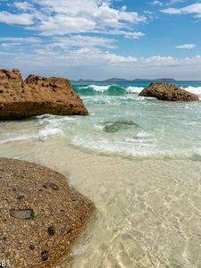 Preview wallpaper shore, sea, water, stones, landscape