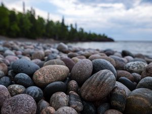 Preview wallpaper shore, stones, pebbles, sea, water