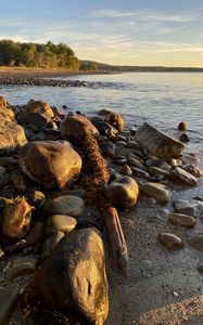 Preview wallpaper shore, stones, sea, horizon, landscape