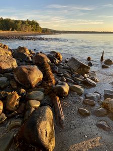 Preview wallpaper shore, stones, sea, horizon, landscape