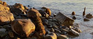 Preview wallpaper shore, stones, sea, horizon, landscape