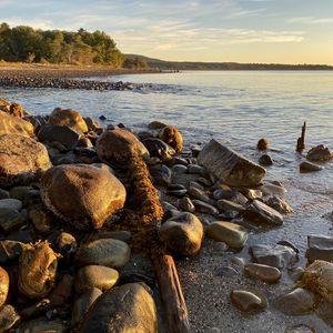 Preview wallpaper shore, stones, sea, horizon, landscape