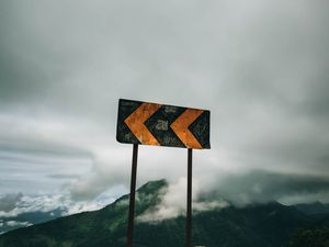 Preview wallpaper sign, arrow, mountains, clouds