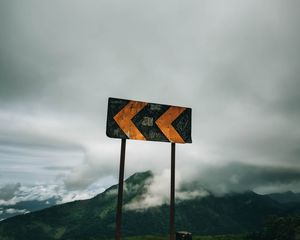 Preview wallpaper sign, arrow, mountains, clouds