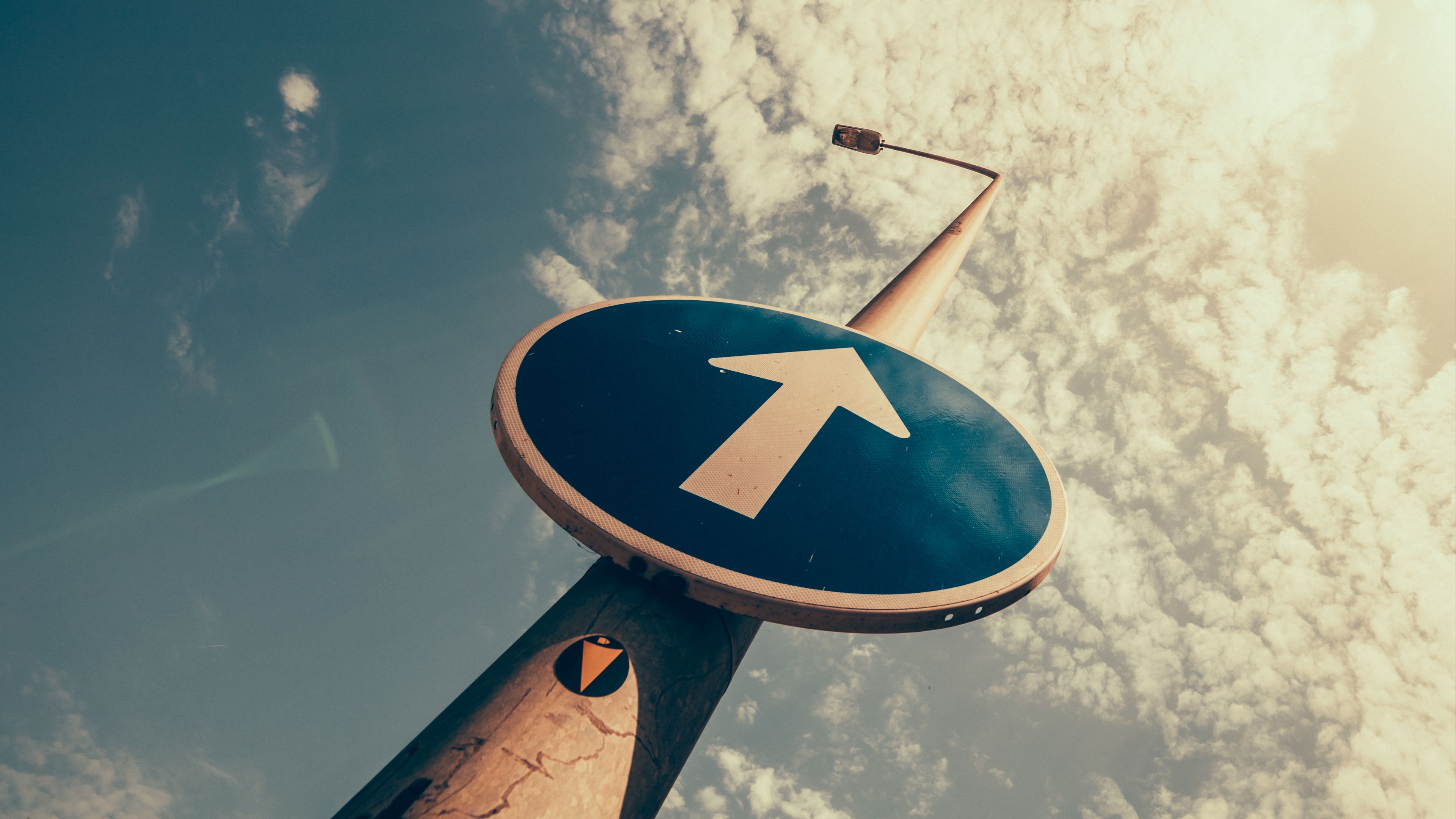 Download wallpaper 3840x2160 sign, direction, pillar, sky 4k uhd 16:9