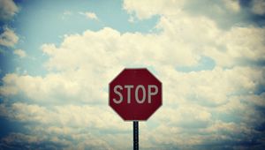 Preview wallpaper sign, road, stop, sky, clouds